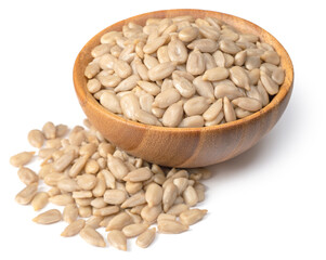 peeled sunflower seeds in the wooden bowl, isolated on whtie background