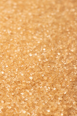 food background of yellow sanding sugar, full frame,