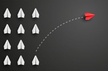 Individuality concept. Individual and unique leader red paper plane flies to the side