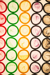 Colorful condoms background.