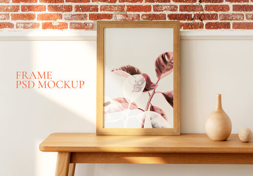 Wooden Picture Frame Mockup On A Wooden Sideboard Table