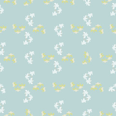 Abstract nature hand drawn seamless pattern with doodle tropic flowers shapes. Pastel blue background.