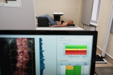 Investigation of the density of human bones using an osteodensitometry apparatus.