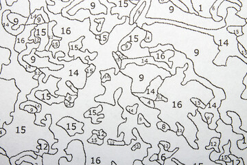Picture by numbers on canvas top view.Picture template for coloring by numbers background.