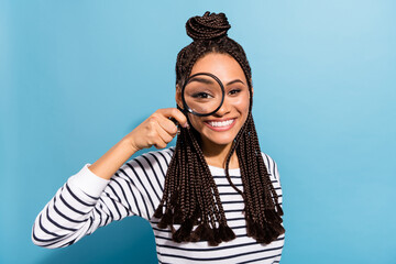 Photo of young afro girl happy positive smile look eye lens vision ophthalmology loupe isolated...