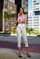 Portrait of young woman at outdoors.