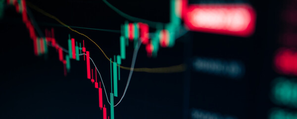 Close up of Bitcoin and Cryptocurrency stock market exchange candlestick chart. Green bullish pumping indicator