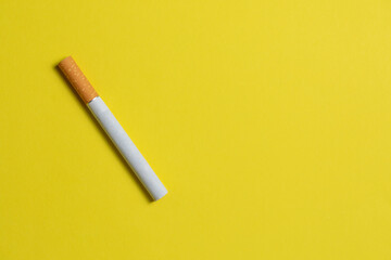 Cigarette On A Yellow Background