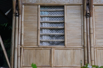 Wind circulation windows with frames and walls made of bamboo in an ecological architectural style...