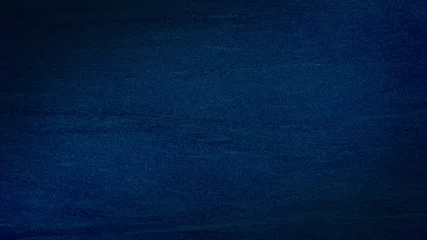Tuinposter donkere zwarte ruwe muur textuur achtergrond. lege blauwe textuur oppervlakte achtergrond, donkere hoeken. ruwe vignet blauwe betonnen textuur (gericht op het midden van de afbeelding). © WONGSAKORN