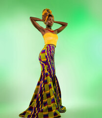 Full length photo of glamour young dark skin woman hold hand turban wear tribal dress isolated on...