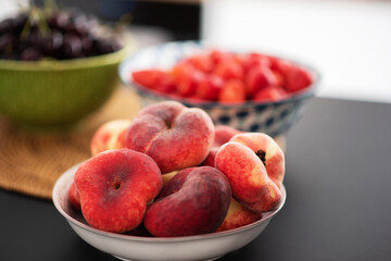 Fruits and berries on the kitchen table.