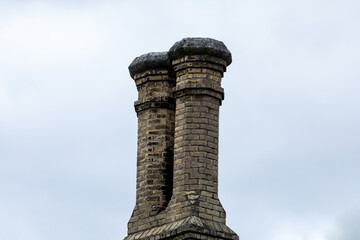 Old yellow brick residential fireplace chimneys built circa 1900