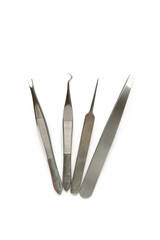 Set of steel tweezers isolated on the white background.