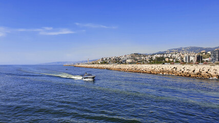 Holiday vacations. Speed motor boat cruising in the sea. Trip with family and friends. Tourism in Lebanon