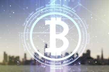 Virtual Bitcoin hologram on blurry skyline background. Multiexposure