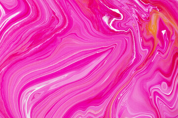 Obraz premium Fluid art texture. Background with abstract mixing paint effect. Liquid acrylic picture with flows and splashes. Mixed paints for posters or wallpapers. Golden, red and pink overflowing colors.