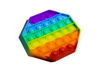 Pop It silicone sensory anti-stress Fidget kid toy colorful rainbow game isolated on white background, copy text space. Calming tools, adult stress reliever popping, trendy push bubble toys