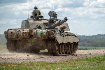 Naklejka premium British army Challenger 2 ii FV4034 Main Battle Tank on deployment in action on a military battle exercise, Wiltshire UK