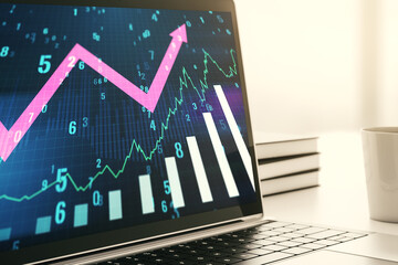Abstract creative financial graph with upward arrow on modern laptop monitor, forex and investment...
