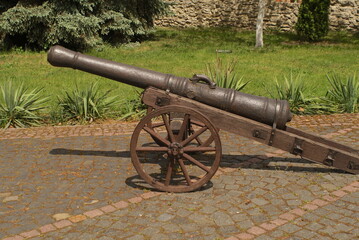 Old cannon on the pavement 