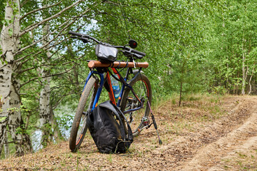 bike and spinning on the road near the river