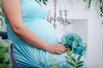 Pregnant woman's belly close up