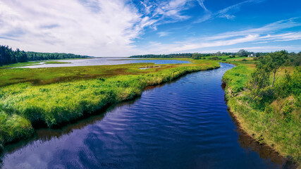 
River and marshland on Cape Breton Island near the Atlantic Ocean in rural Nova Scotia, Canada on...