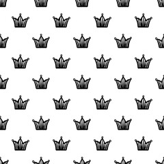 Small black ink crowns isolated on white background. Cute monochrome seamless pattern. Vector simple flat graphic hand drawn illustration. Texture.