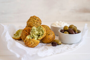 Cheese balls with green olives.