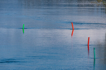 Fagersta, Sweden May 25, 2021 Red and green navigation markers on the Stromsholms canal.