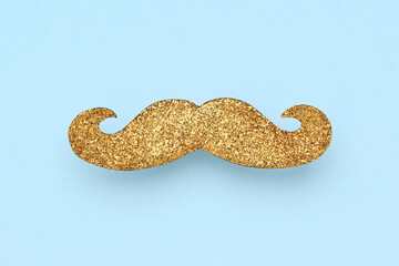 Gold glitter mustache on blue background, Father's Day greeting card design.