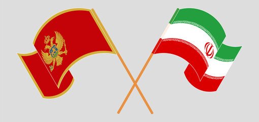 Crossed and waving flags of Montenegro and Iran