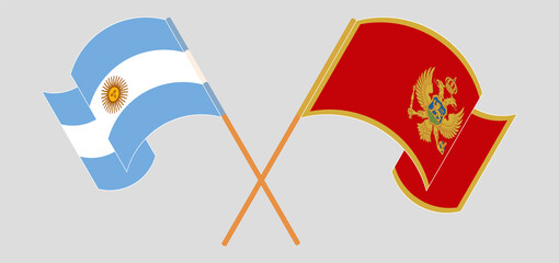 Crossed and waving flags of Argentina and Montenegro