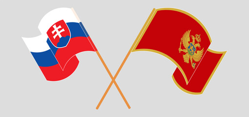 Crossed and waving flags of Slovakia and Montenegro
