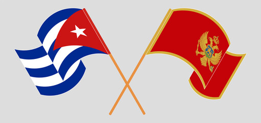 Crossed and waving flags of Cuba and Montenegro