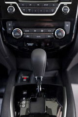 New modern car with automatic transmission. Modern transportation. Close up.