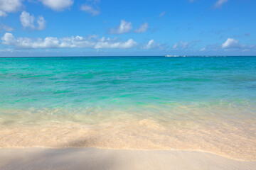 Fototapeta na wymiar Beautiful caribbean sea and blue clouds sky.