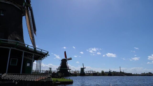 Windmills of Zaanse Schans in Dutch landscape