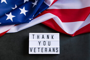 Fototapeta na wymiar Memorial day. American flag on dark background. Remember and honor. Thank you veterans.