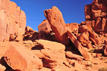 Fototapeta na wymiar Massive orange fallen boulders found in the American southwest desert