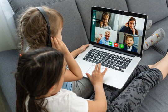 Distance learning online education. A school girls study at home and do school homework. A home distance learning.