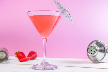Strawberry red cocktail .Fresh summer Mojito with rum and raw strawberries fruits drink.