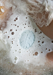 Bath bomb in water. Dissolving the bath bomb.