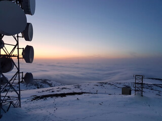 Telecommunications mast on the mountain top