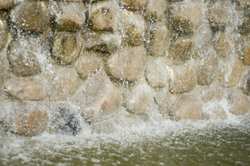 rock in the water, stream with rocks