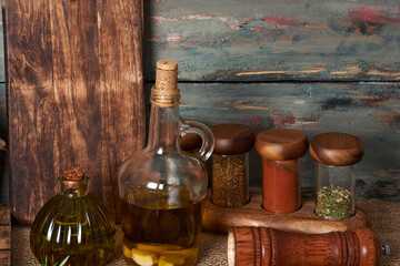Obraz na płótnie Canvas elements to give flavor and color to homemade food such as olive oil, spices and aromatic herbs