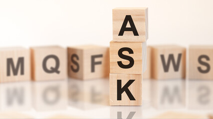 word ask from wooden blocks with letters, concept