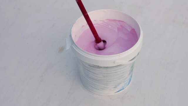 mix paint and pigment pink with a mixer