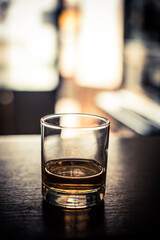 Whisky glass on a wooden surface